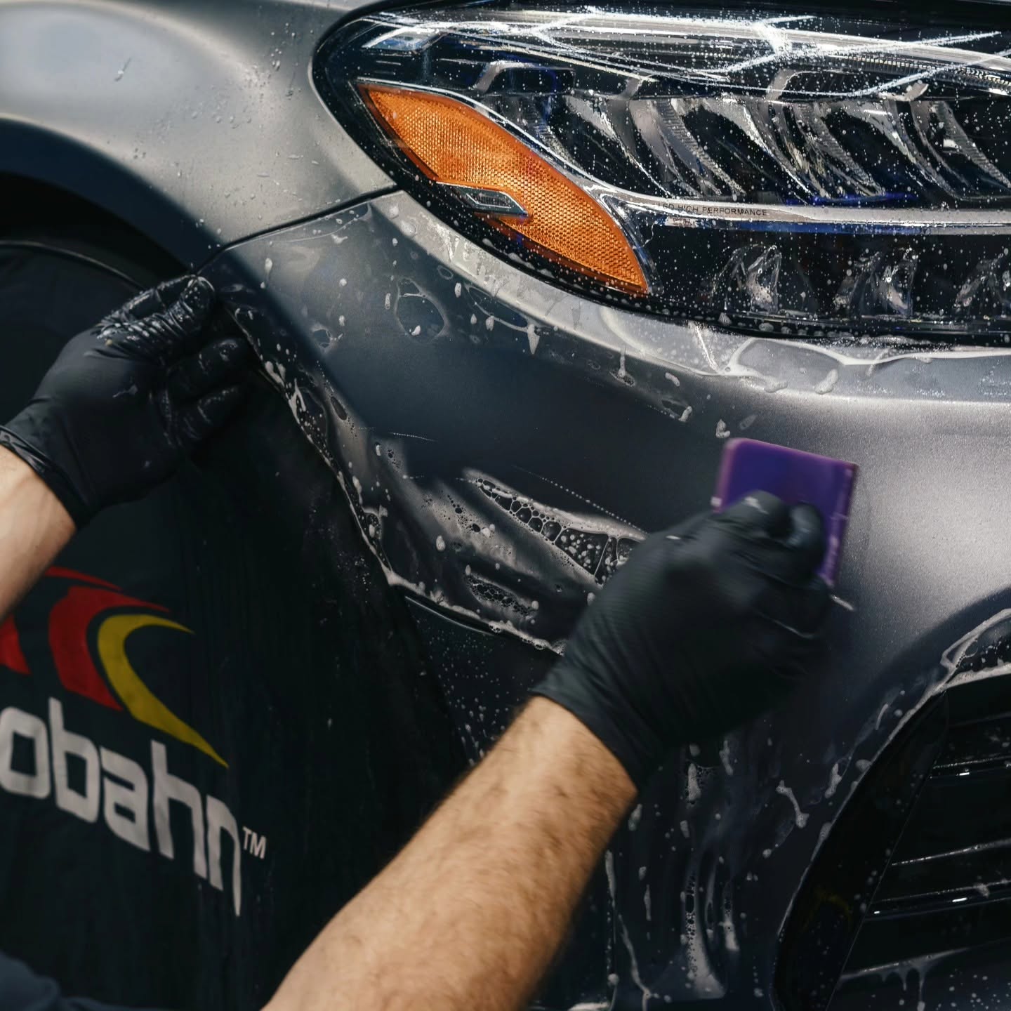 Paint protection film being positioned during installation
